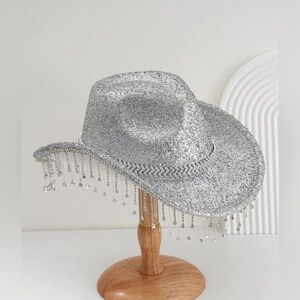 Silver cowgirl hat.